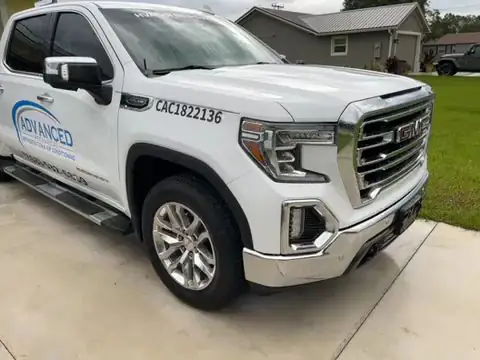 Advanced Mechanical pickup truck lettered with license CAC1822136